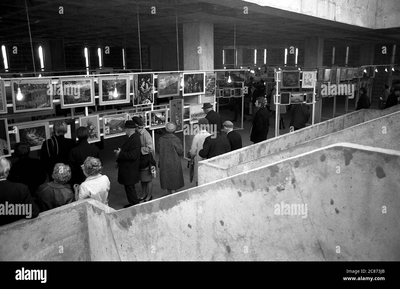 AJAXNETPHOTO. 1969. PORTSMOUTH, ENGLAND. - ART EXHIBITION - AN ART EXHIBITION STAGED IN THE CONCRETE TRICORN BUILDING ONCE VOTED 2ND UGLIEST IN BRITAIN. NOW (2020) DEMOLISHED.PHOTO:JONATHAN EASTLAND/AJAX REF:6910 34 202206 9 Stock Photo