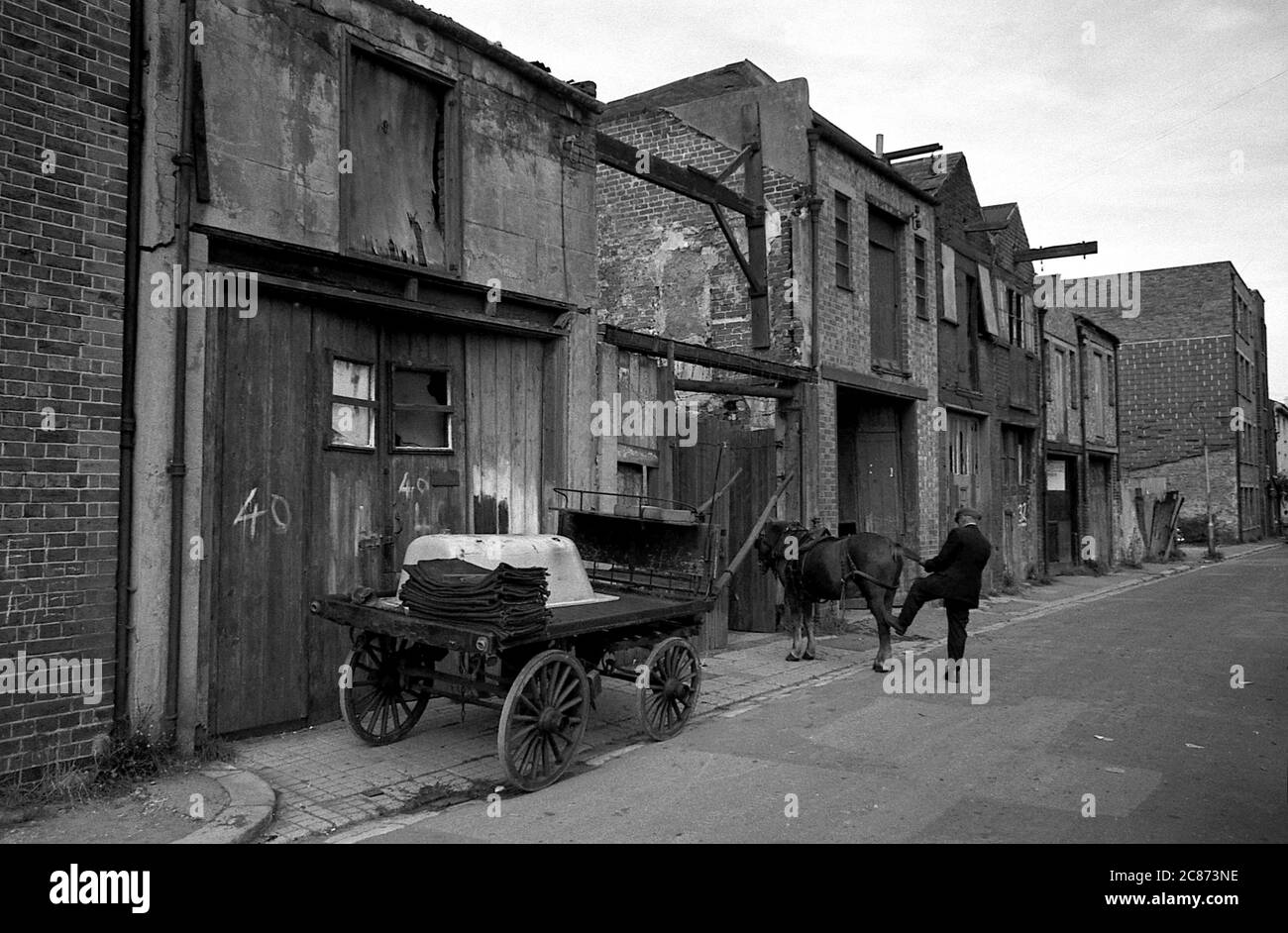 AJAXNETPHOTO. 30TH SEPTEMBER, 1969. PORTSMOUTH, ENGLAND. - FORCED OUT - IN SUSSEX STREET; LAST PICTURES OF THE TOTTERS AND THEIR STABLES IN SUSSEX STREET BEFORE THE BUILDINGS WERE DEMOLISHED. PHOTO:JONATHAN EASTLAND/AJAX REF:356950 51 202206 45 Stock Photo