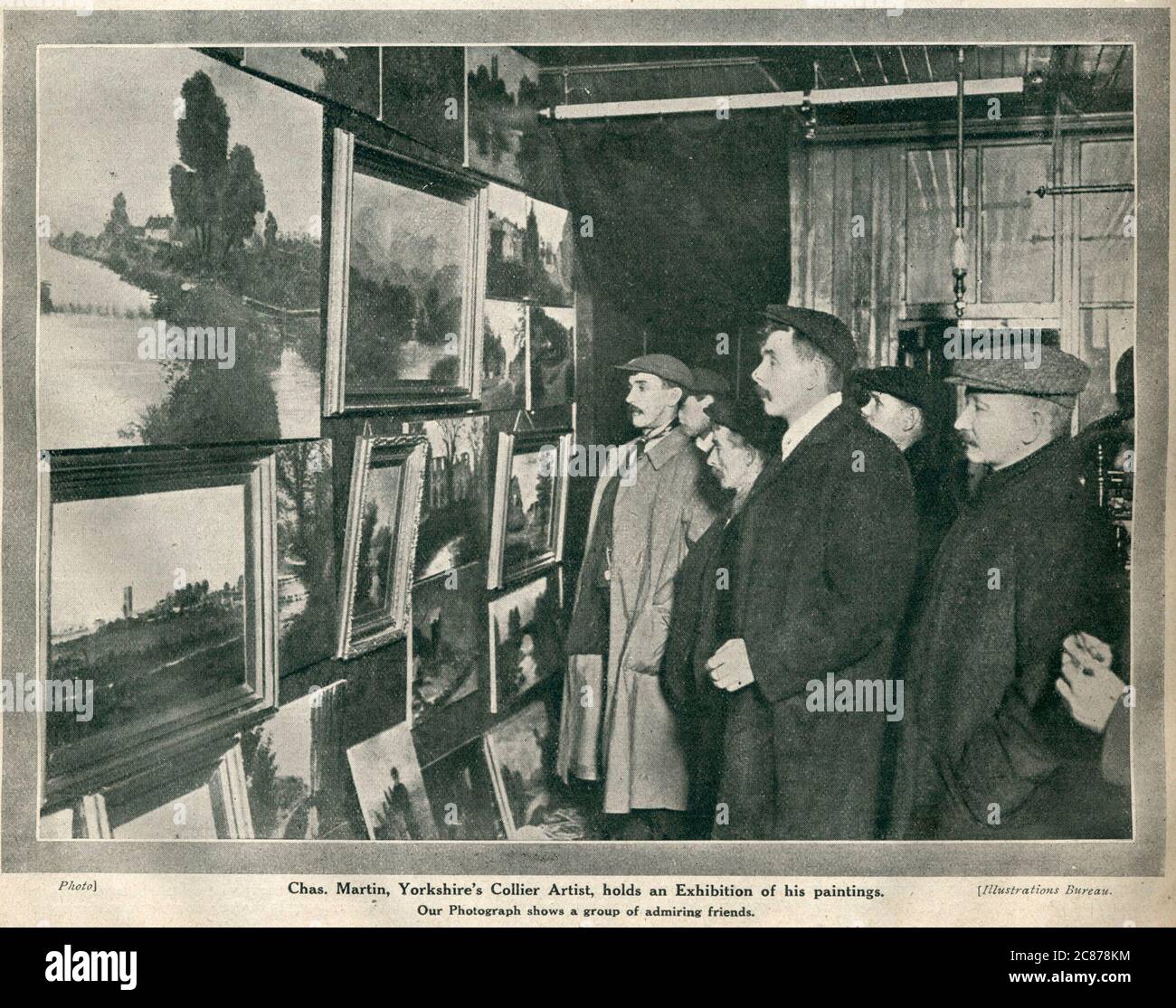 Friends of the Yorkshire miner Charles Martin, who worked at Dinnington Colliery, admire an exhibition of his paintings. See picture no. 13127079 for a photograph of Martin. Stock Photo