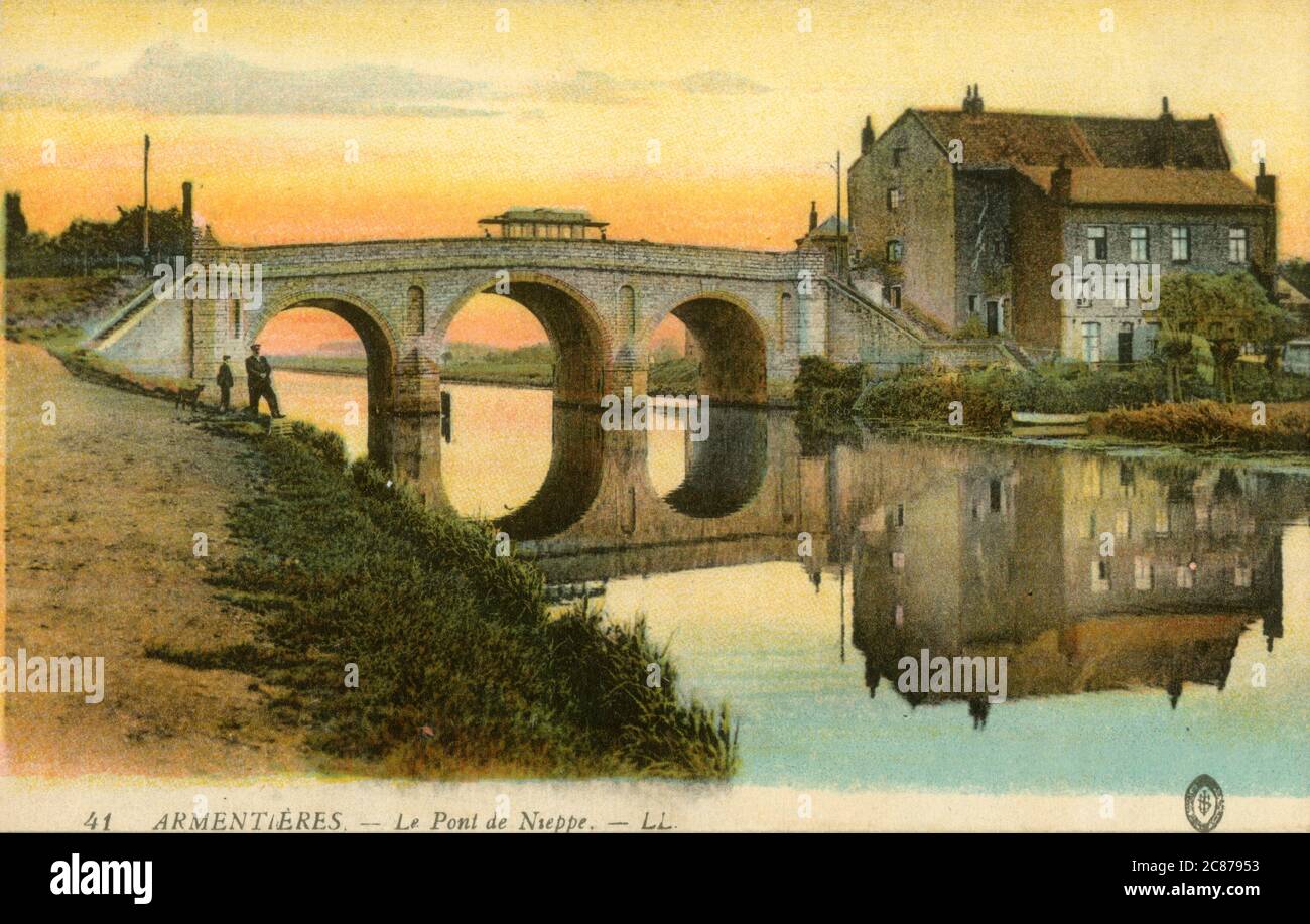 Armentieres - Le Pont de Nieppe. During World War I, in April 1918, German forces shelled Armentieres with mustard gas. British troops were forced to evacuate the area but German troops could not enter the commune for two weeks because of the heavy contamination. Witnesses to the bombardment stated that the shelling was so heavy that liquid mustard ran in the streets. This beautiful 18th century three span bridge was also destroyed during the war.     Date: circa 1900s Stock Photo