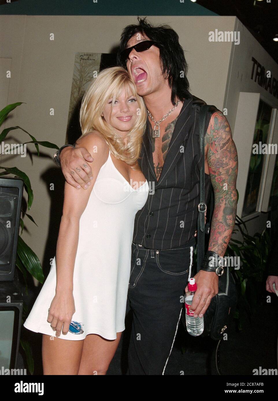 ARCHIVE: LAS VEGAS, NV. July 11, 1997: Baywatch star DONNA D'ERRICO & husband Motley Crue guitarist NICKI SIXX at the Video Software Dealers Assoc. convention in Las Vegas. File photo © Paul Smith/Featureflash Stock Photo