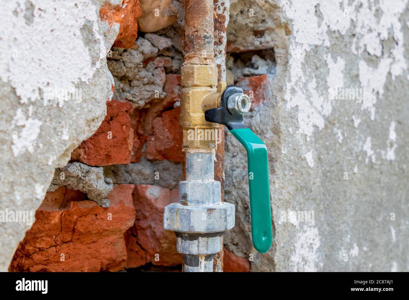 Plumbing repair work, fix water leak, replacement of union joint and value Stock Photo