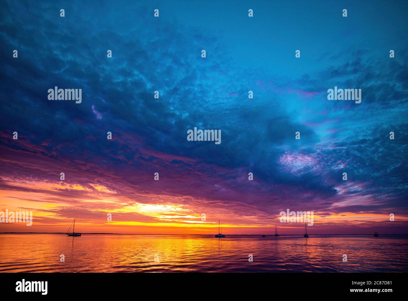 Sunrise over the sea and beautiful cloudscape. Sunset on tropical beach ...