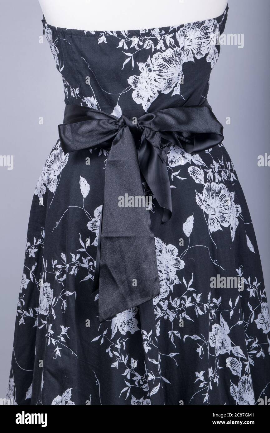 A Tailors Mannequin dressed in a Black and White Floral Dress with ...
