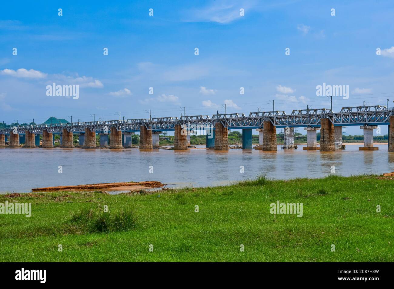 Kesinga, Kalahandi, Odisha, India. 26 June 2020. Indian Railways Bridge Over Tel River At Luthurband With Beautiful Natural Scenery. Stock Photo