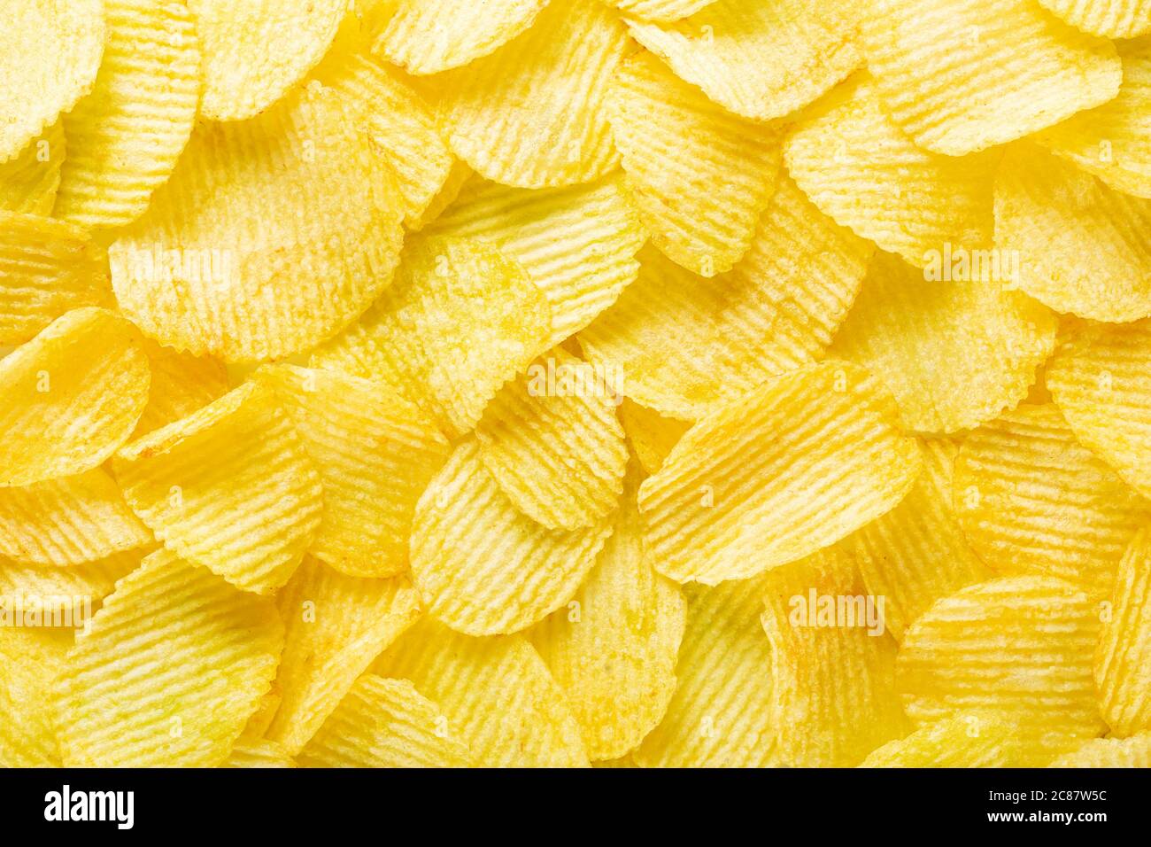 background corrugated golden chips with texture Stock Photo