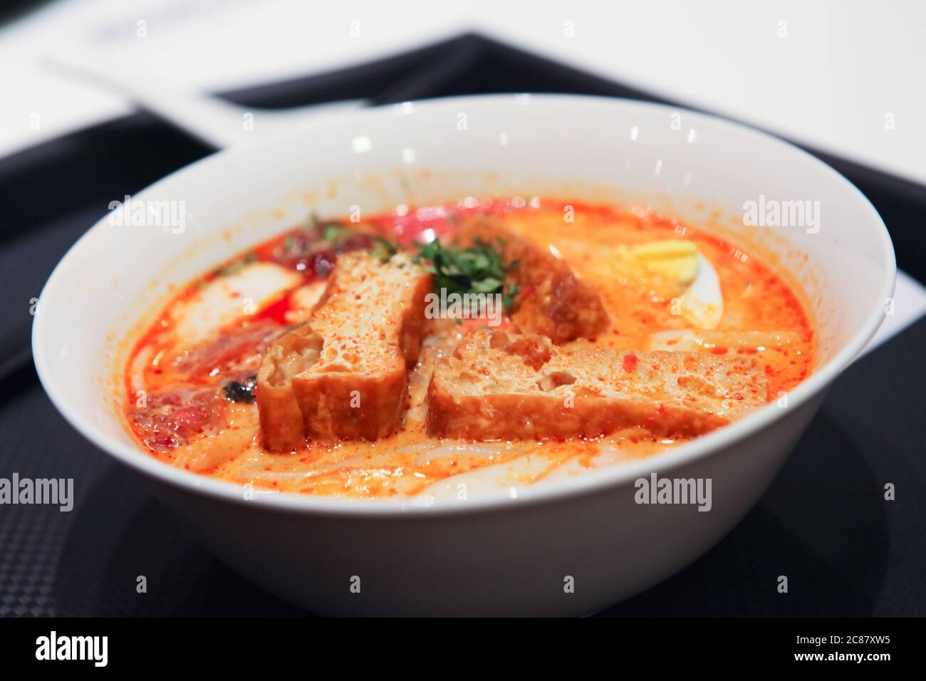 Laksa is a spicy noodle soup popular in the Peranakan cuisine of