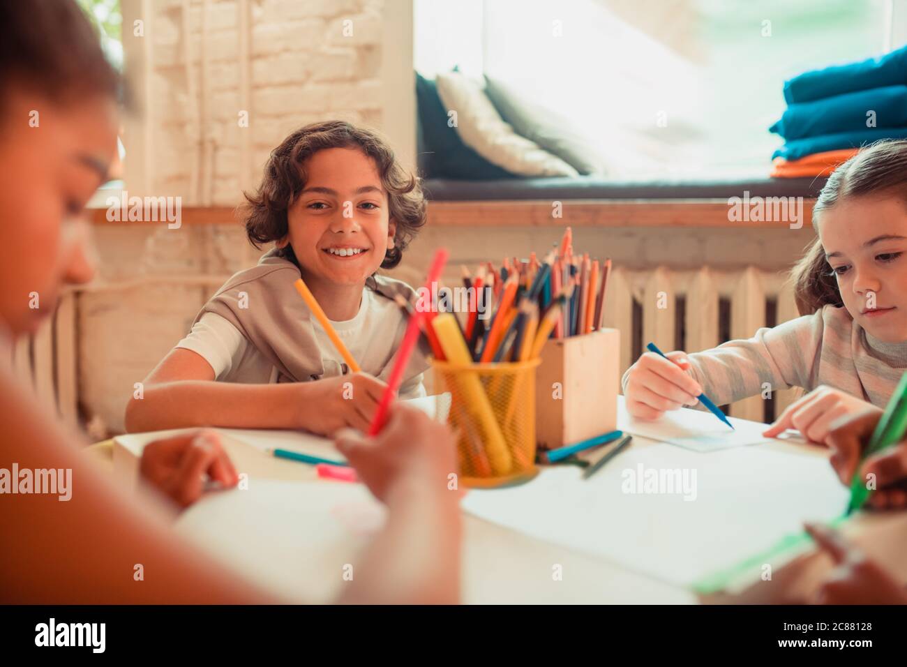 Boy Drawing With Pencils Together With Girls Stock Photo Alamy Boy Drawing With Pencils Together With Girls Stock Photo Alamy