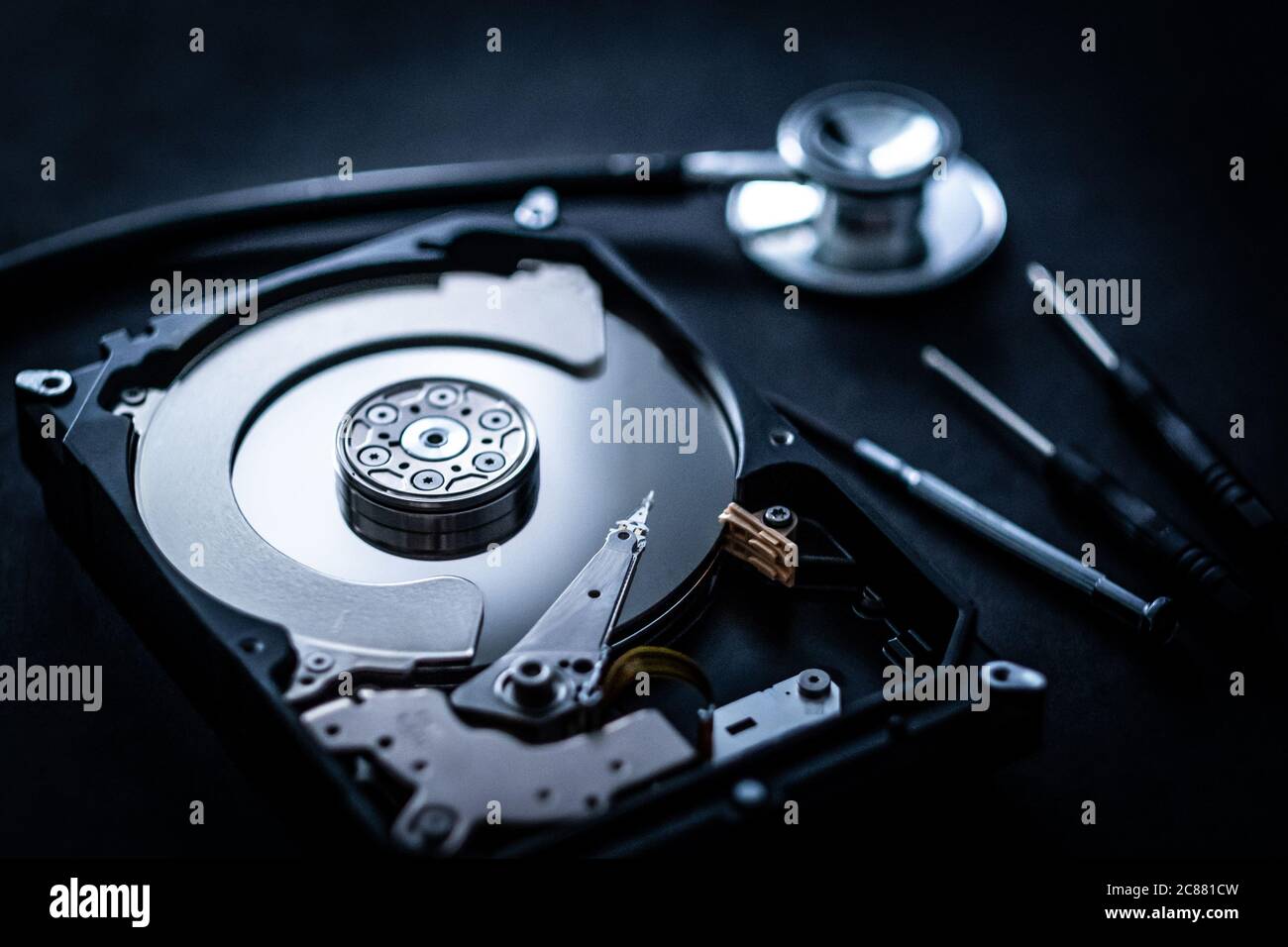 computer hard drive disk repair process, close up Stock Photo