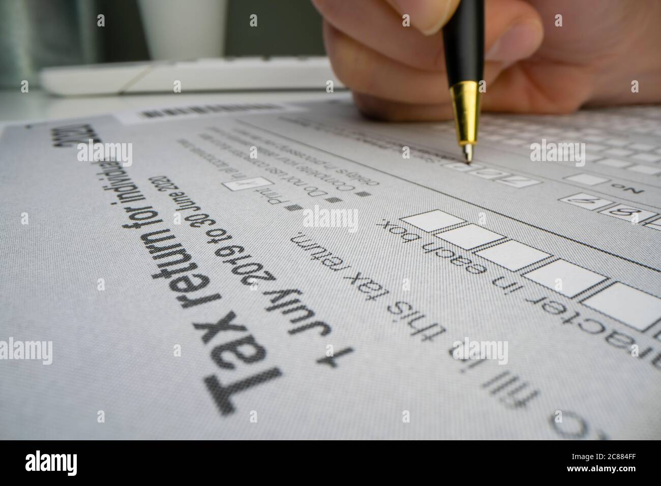 Completing Australian tax form Stock Photo Alamy
