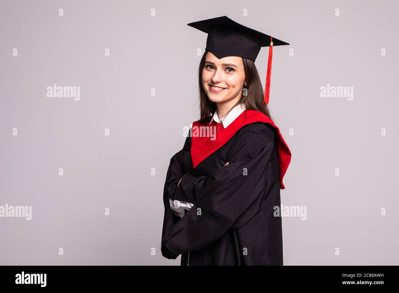 Educational theme: graduating student girl in an academic gown