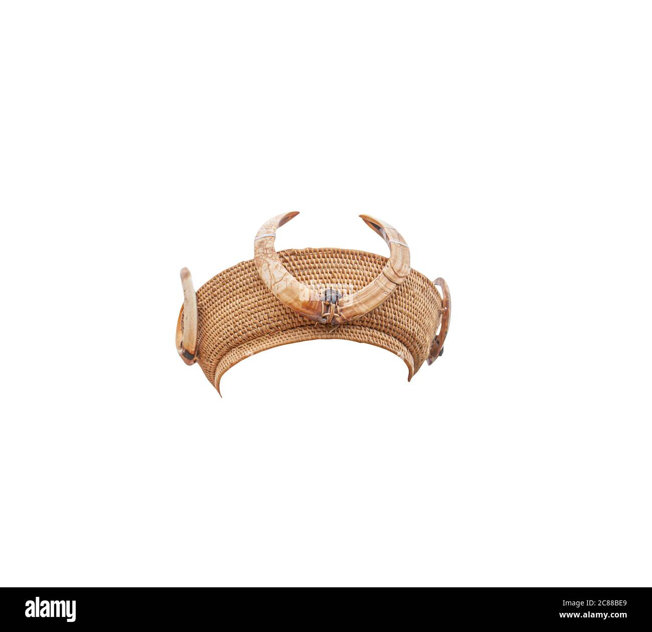 Kachin or Jingpo traditional rattan hat with tusks of a wild boar, isolated on white background with clipping path. Straight front view. Stock Photo
