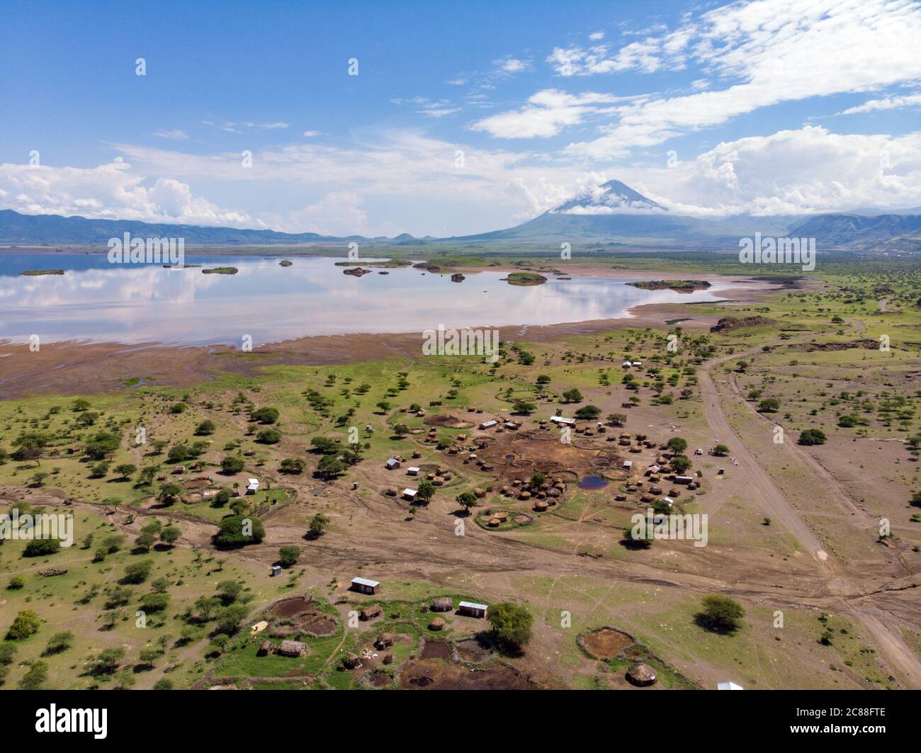 Aerial view of Maasai boma or family rural village on the coast of