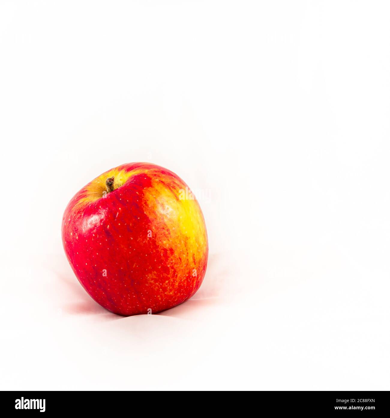 Red dessert apple on white background Stock Photo