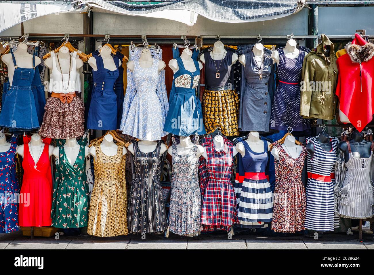 Women summer dresses on display at Camden market in London Stock Photo -  Alamy