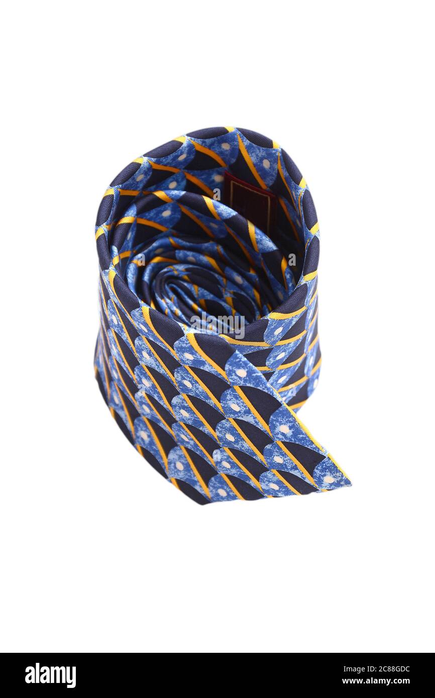 Patterned striped necktie laying on white background Stock Photo