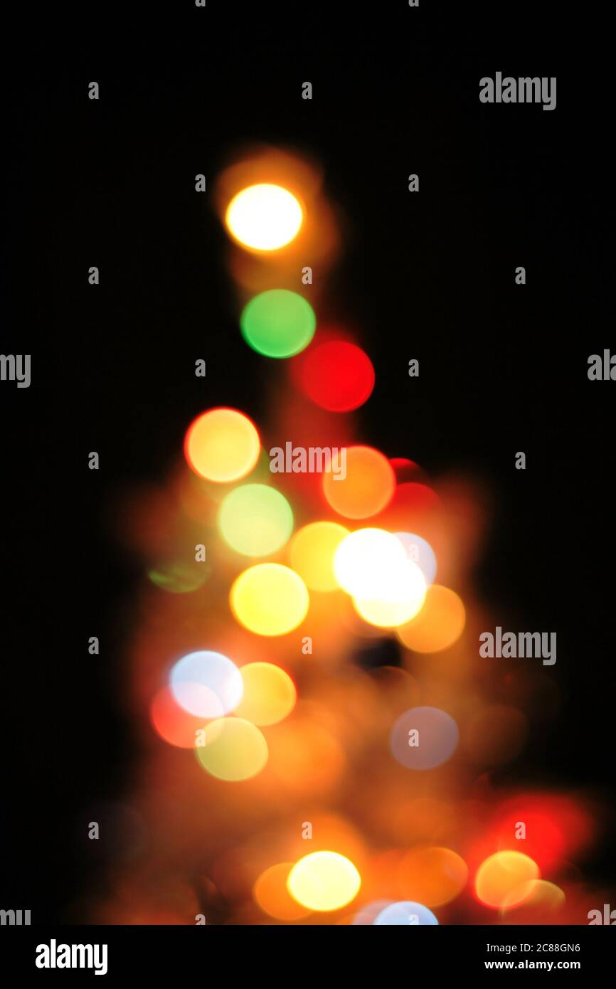 abstract christmas tree background (color lights) in the dark Stock ...