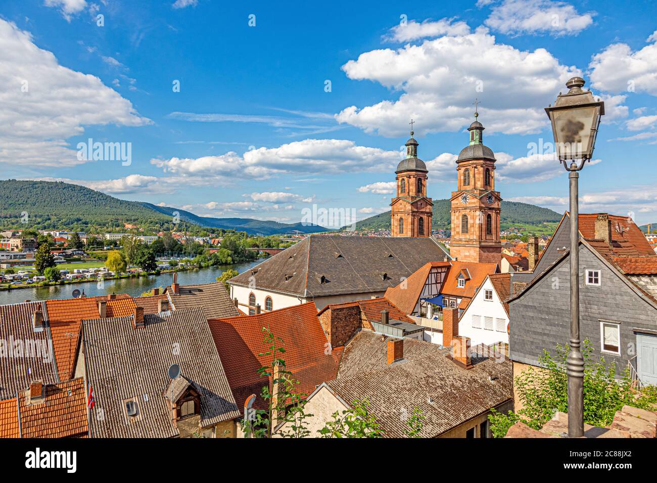 View to St. Jacobus church in the medieval German city of Miltenberg during daytime Stock Photo