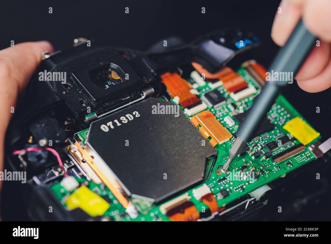 Engineer and technician Minitures are fixing camera mirror box assembly