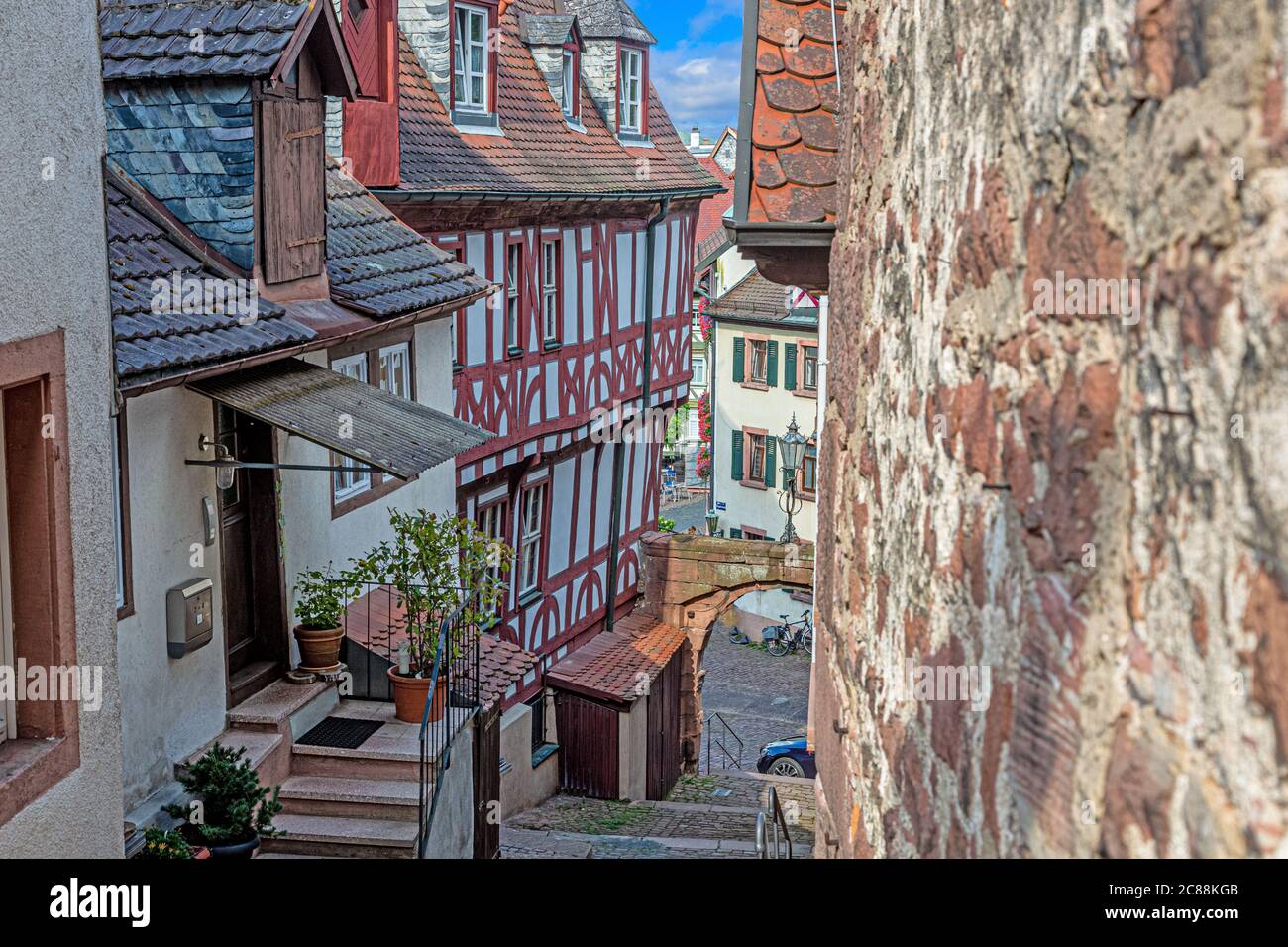 Small alley in the medieval German city of Miltenberg during daytime Stock Photo
