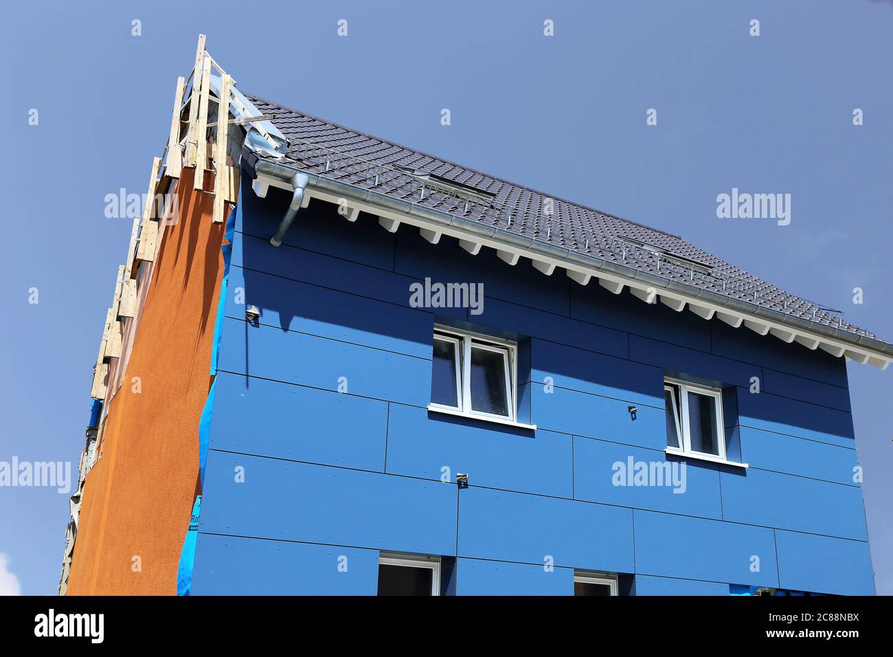 Residential home with facade cladding Stock Photo