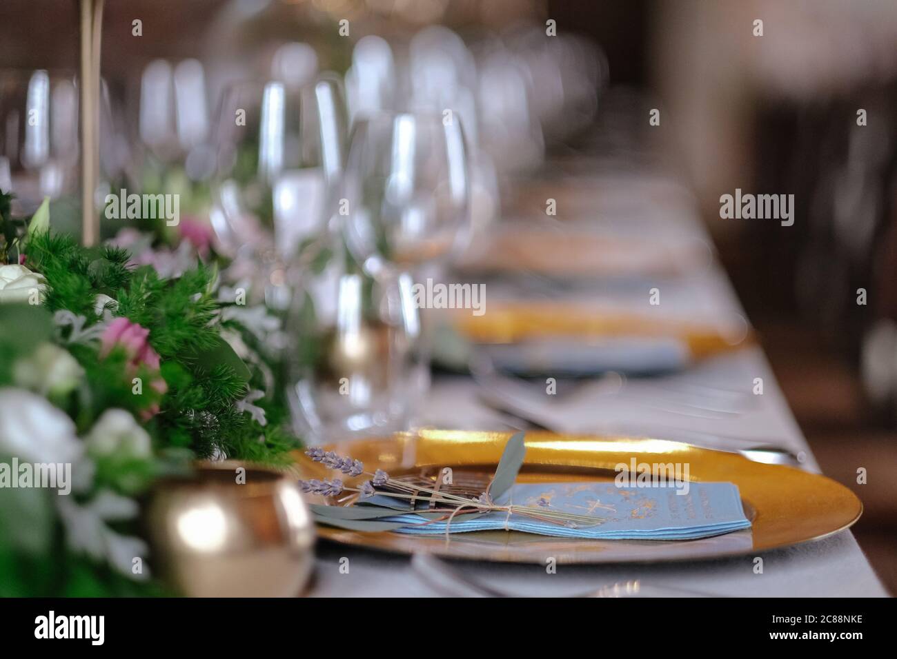 Wedding table with floral decorations Stock Photo - Alamy