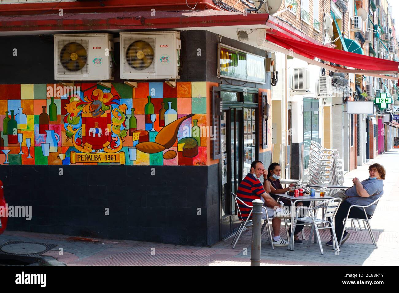 https www alamy com 22nd july 2020 carabanchel madrid spain people with face masks below their chins sit outside a cafe in the carabanchel district of madrid many european countries are returning to normal life after lockdowns to prevent the spread of the covid 19 coronavirus with social distancing mask wearing and other restrictions in place in spain wearing masks on public transport in shops cafes restaurant and enclosed public spaces is compulsory despite these controls some local lockdowns have been imposed in some parts of spain to try and control new outbreaks of the virus image366528679 html