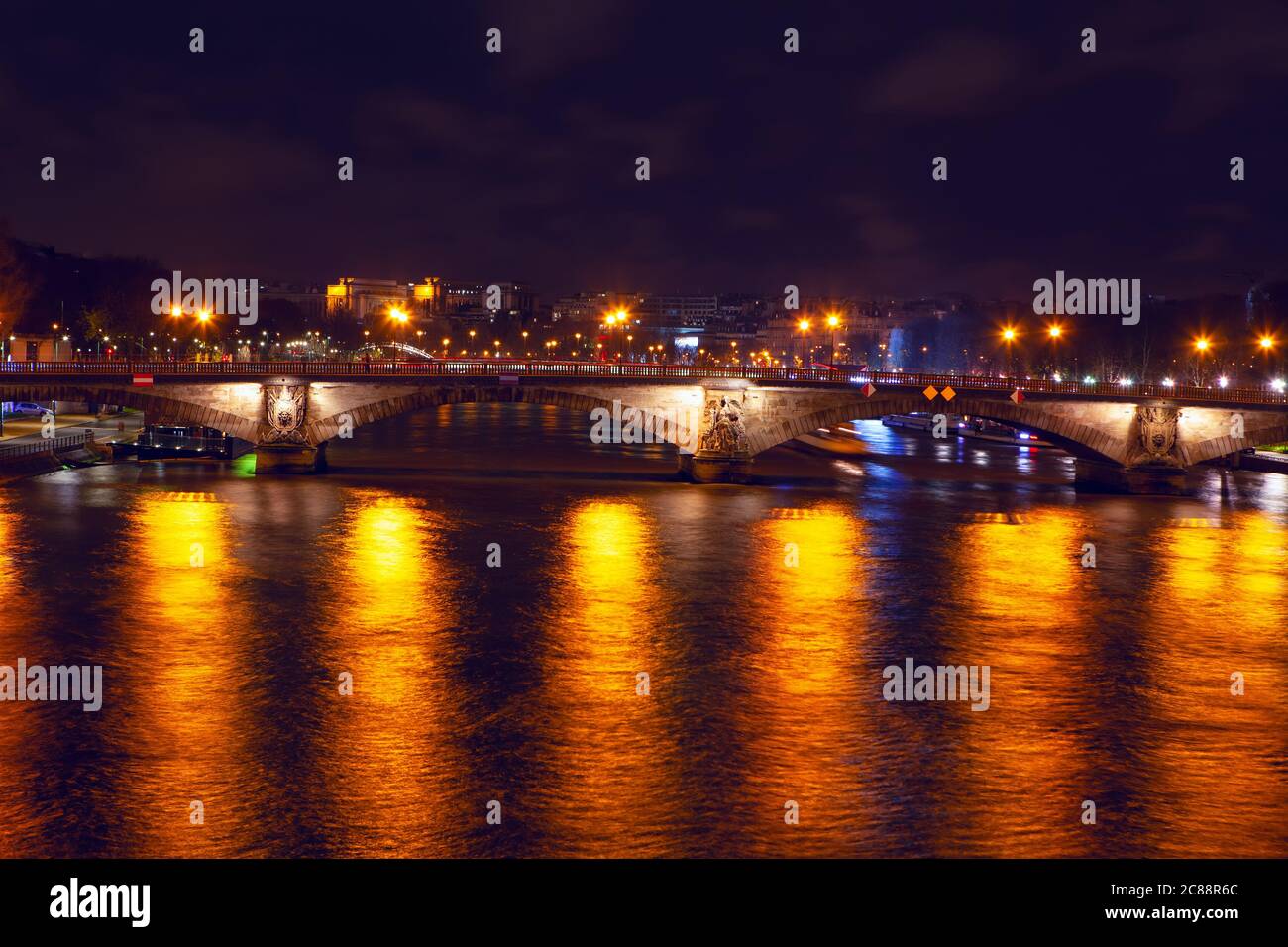 Pont des Invalides In the night illumination . Night view of Seine ...
