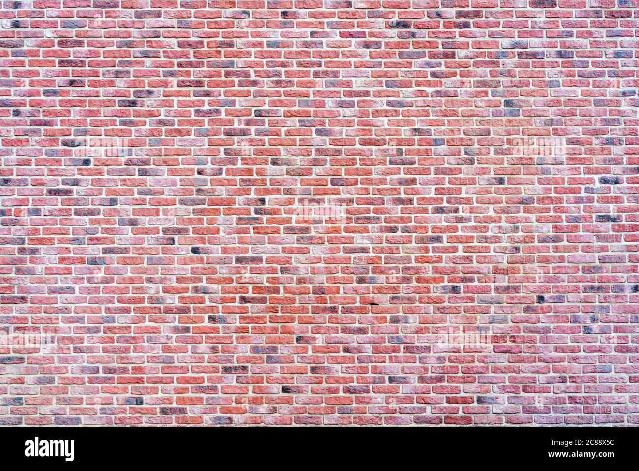 Old vintage red brick wall textured background. Stock Photo
