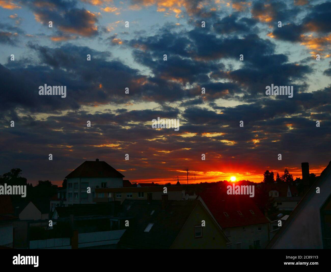 Laupheim, Germany: Sunset over the city Stock Photo