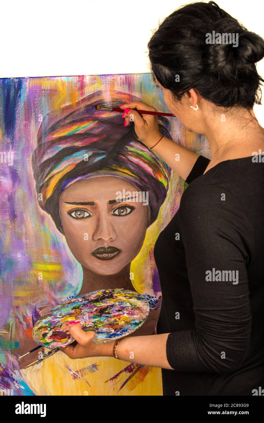 African woman painting hi-res stock photography and images - Alamy