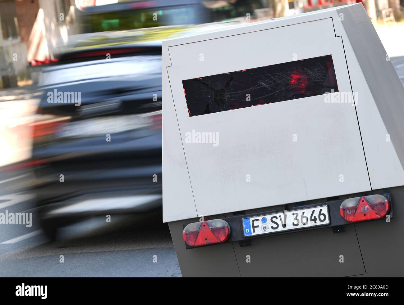 22 July 2020, Hessen, Frankfurt/Main: A so-called enforcement trailer of  the Frankfurt Road Traffic Office for speed monitoring is located on the  edge of Hanauer Landstraße in the east of Frankfurt. The