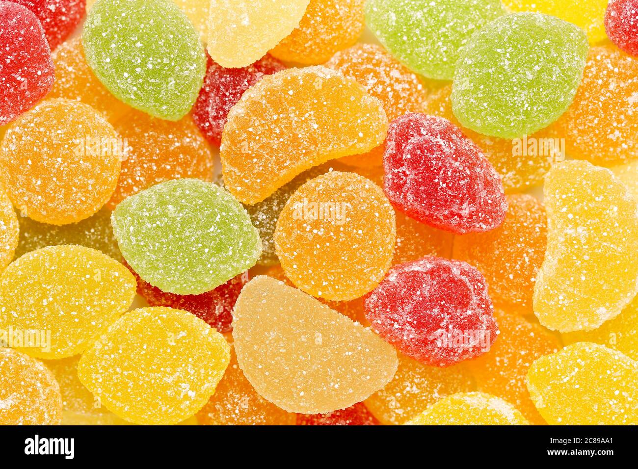 sugar coated jelly candy in the shape of fruit Stock Photo Alamy