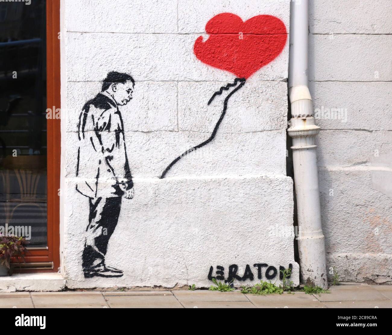 Cracow Krakow Poland Graffiti Inspired By Famous Banksy S Girl With Baloon With Jaroslaw Kaczynski In Place Of The Girl Painted In Kazimierz Stock Photo Alamy