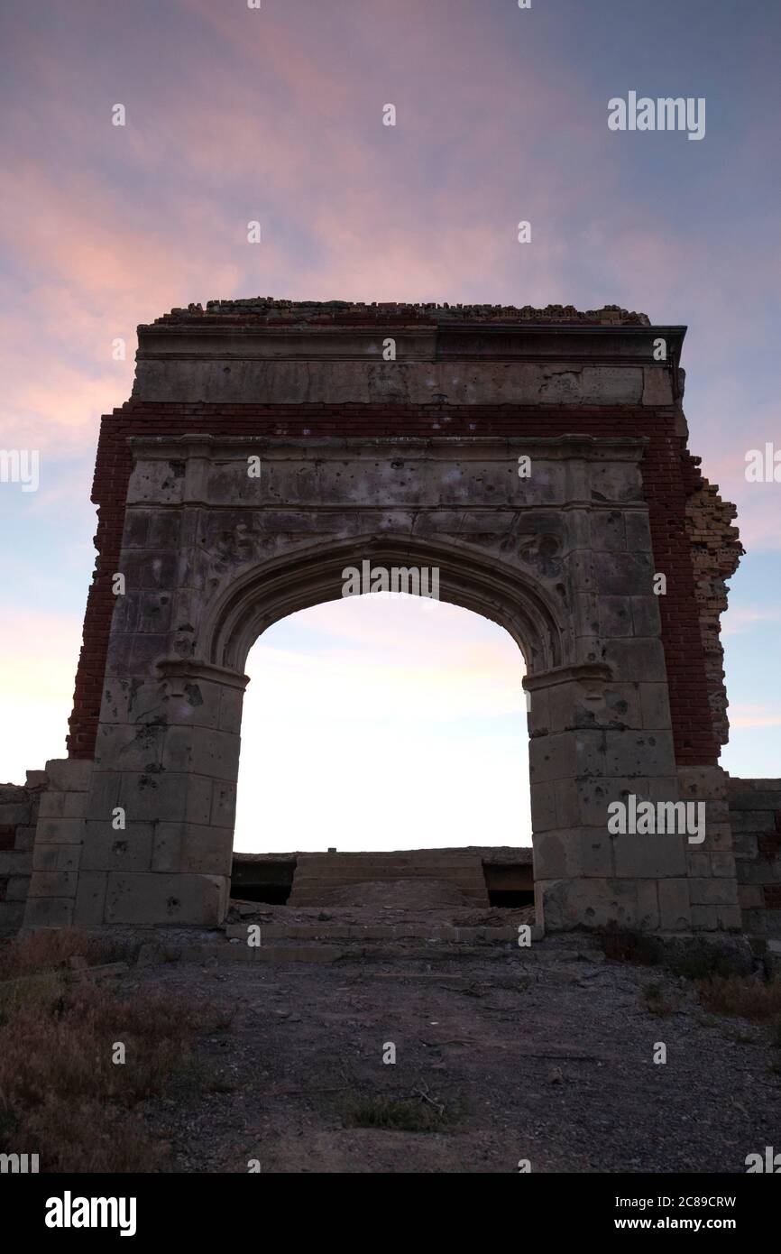Archway of the abandoned school building in the ghost town in the desert of Northern Nevada near Wells Stock Photo
