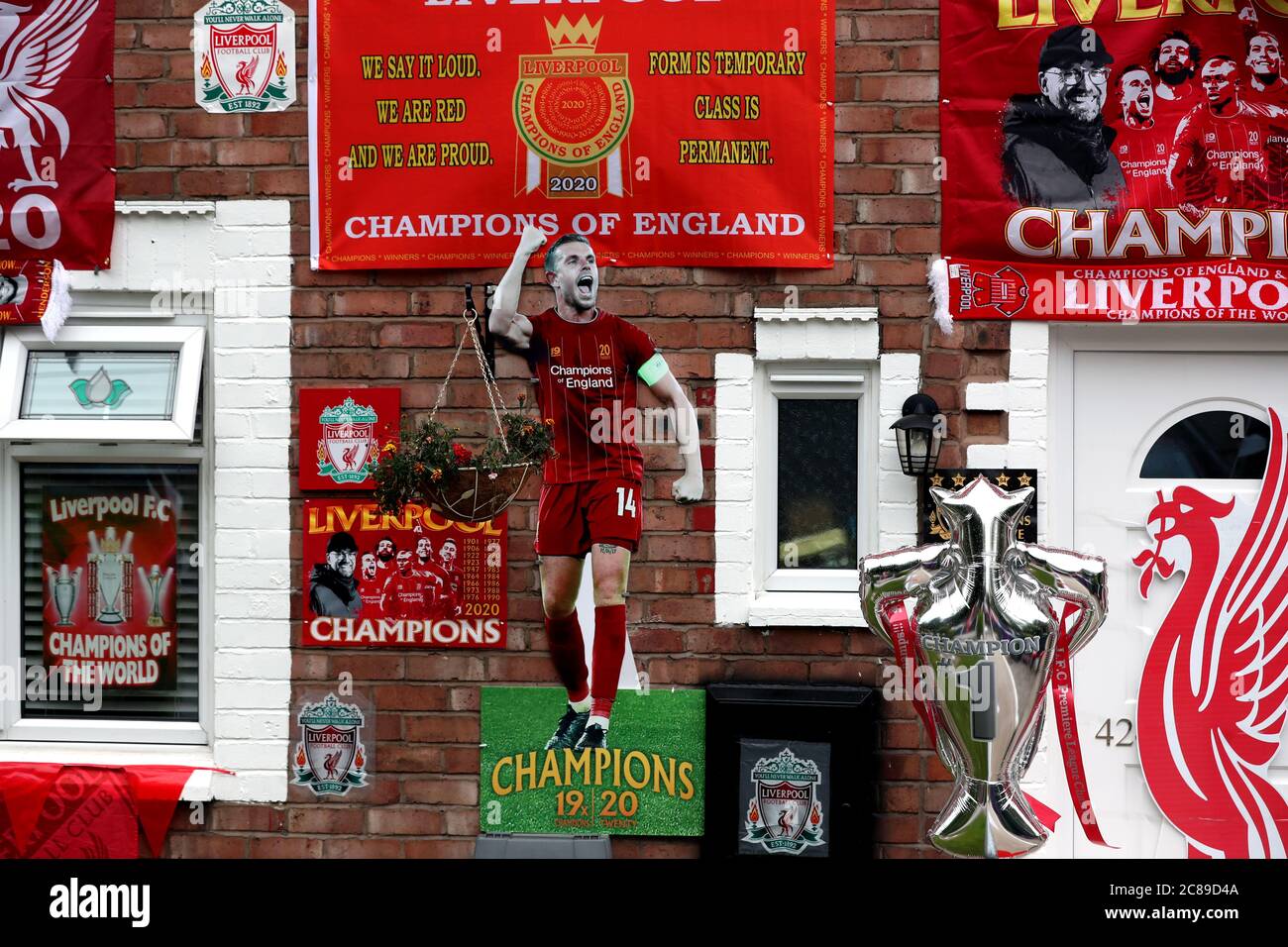 Liverpool team will lift premier league trophy tonight following hi-res stock photography and images