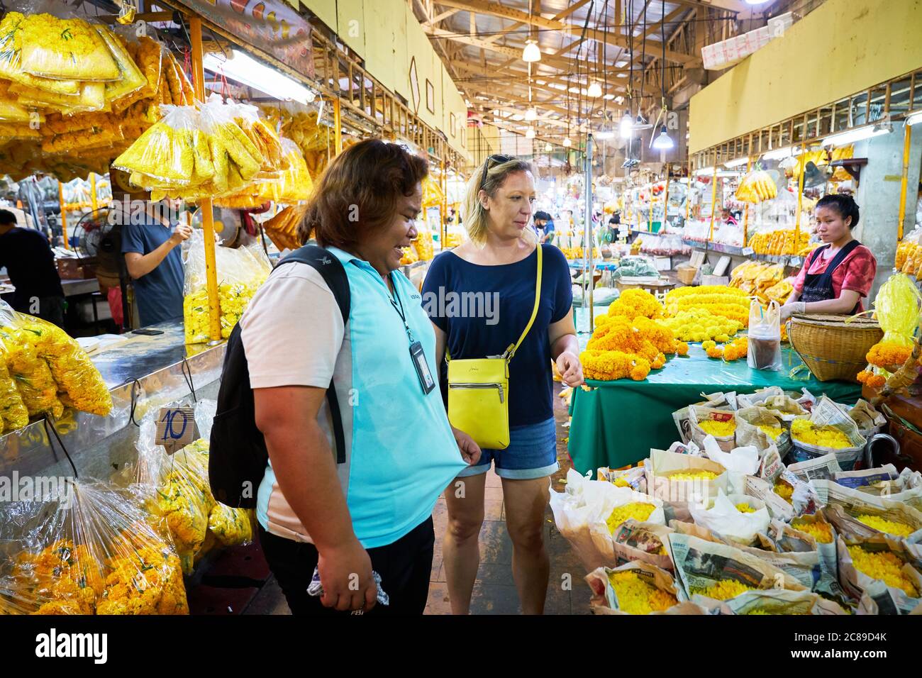 Touring around the flower market with an expert guide downtown Chak Phet Road,Bangkok Stock Photo