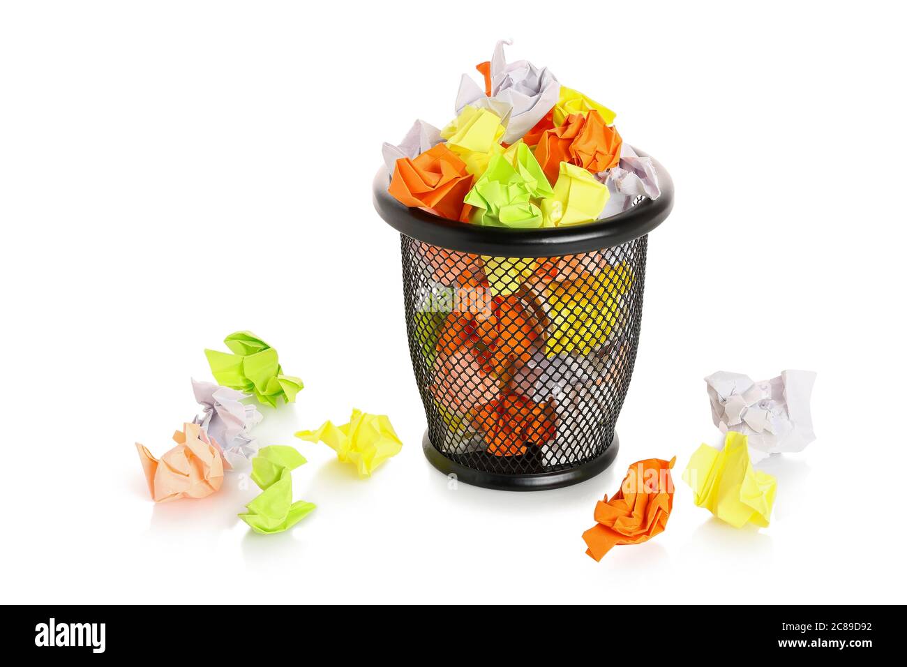 trash can with colorful and crumpled paper notes isolated on white ...