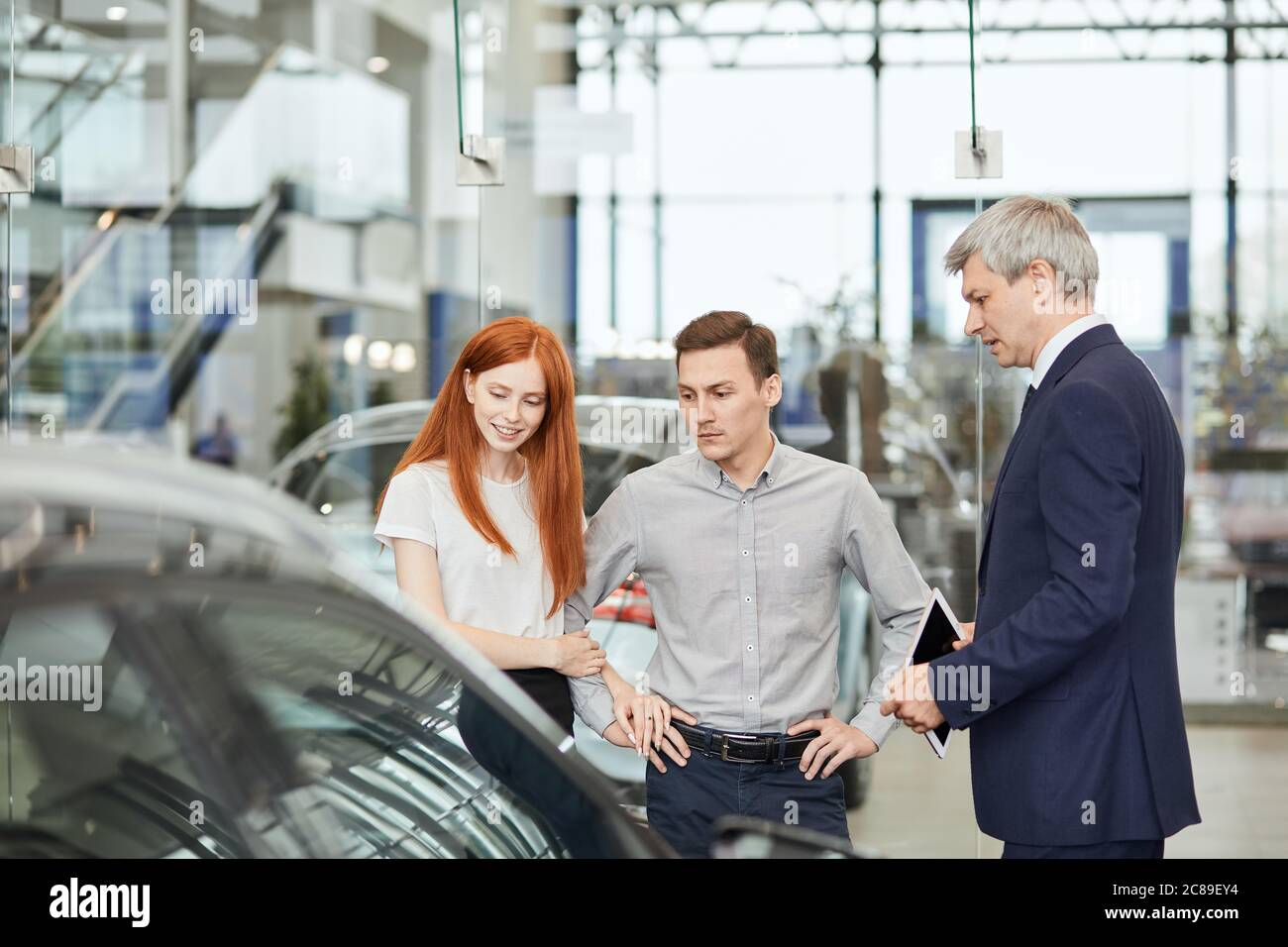 Car Business, Car Dealership, Customers and Rep Concept. Salesman