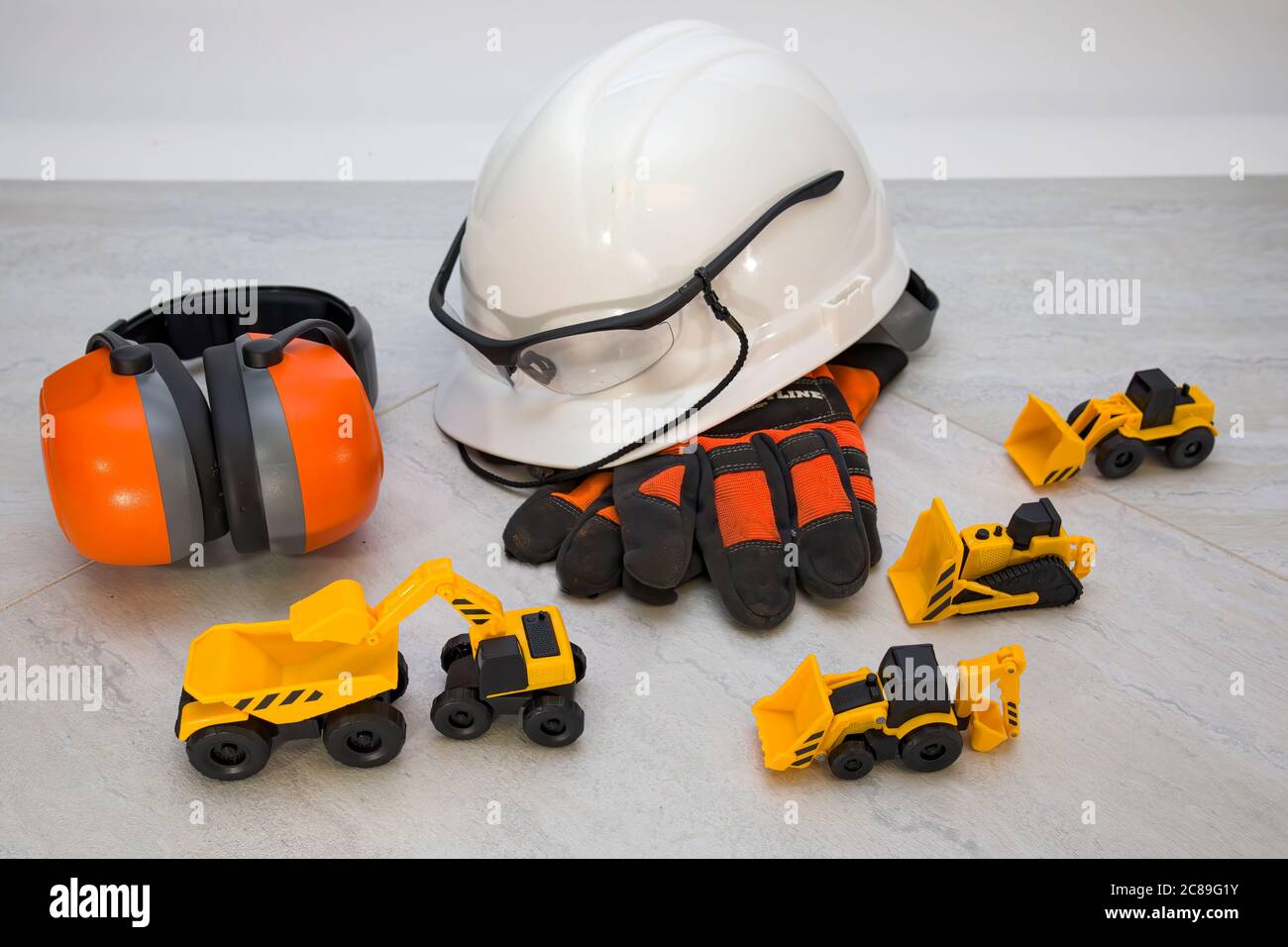Dress up props for children playing construction worker Stock Photo Alamy