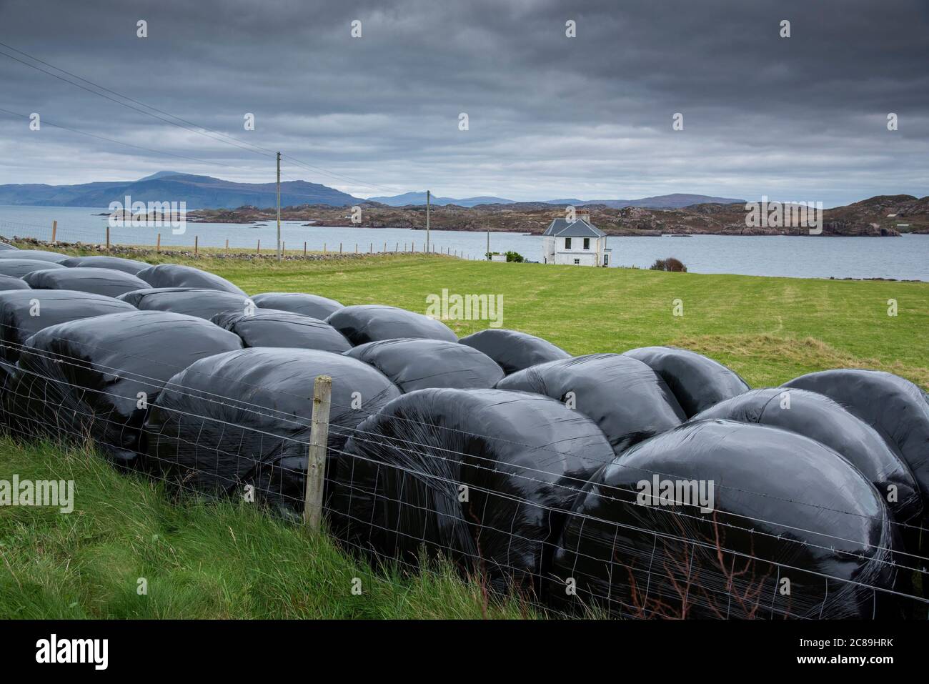 Silage bales on Iona, Inner Hebrides off the Ross of Mull, Argyll and Bute, Scotland, United Kingdom. Stock Photo