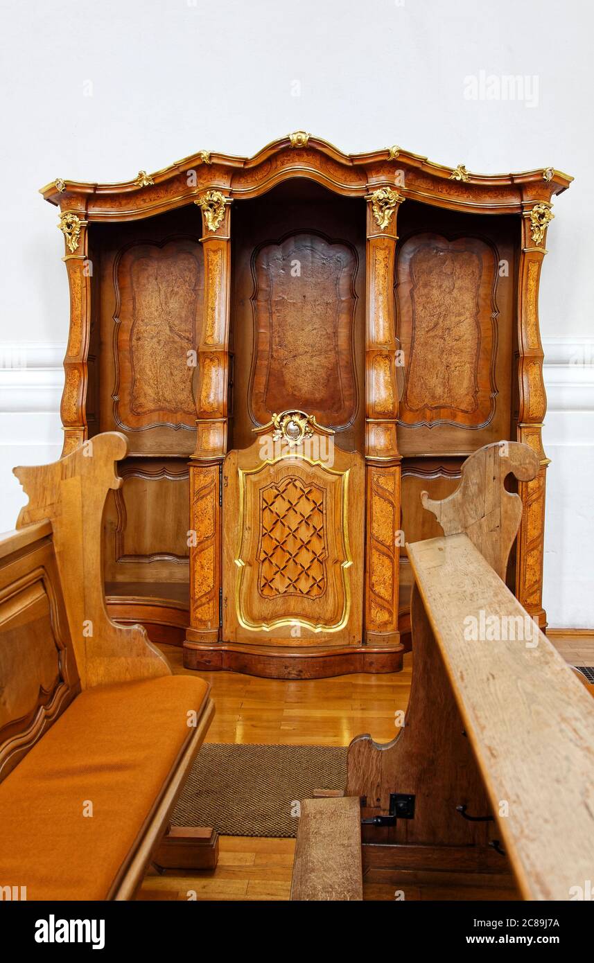 open confessional, decorative wood, no doors, pew, St. Paulin Basilica; 1753; catholic Church, old religious building, Europe, Trier; Germany Stock Photo