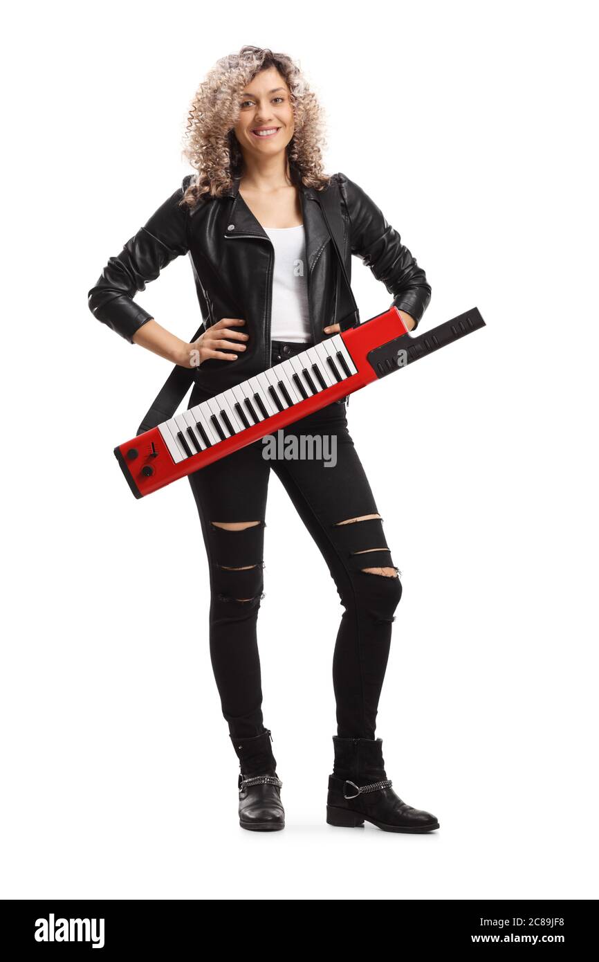 Full length portrait of a female musician with a keytar synthesizer isolated on white background Stock Photo