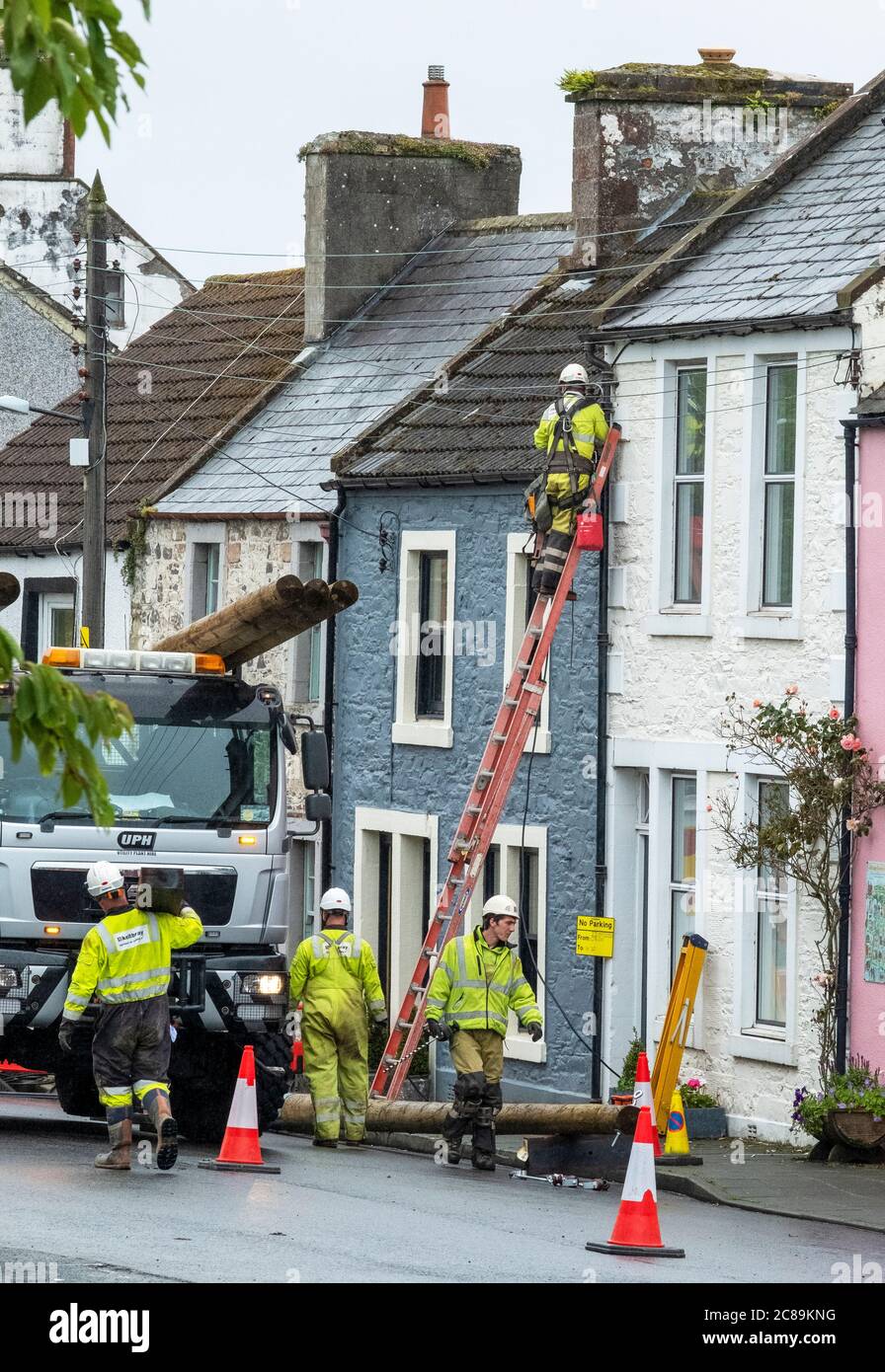 Keltbray electrical engineers replace overhead power cables in Wigtown town centre, Dumfries & Galloway, Scotland. Stock Photo