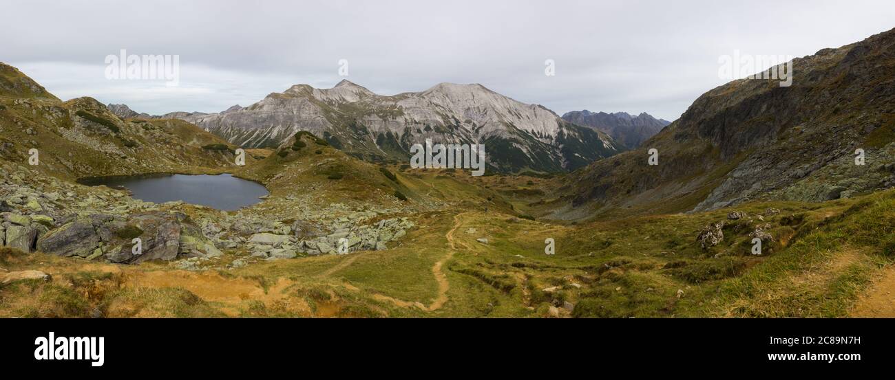 Mountain panorama landscape with the Stoneman Taurista mountainbike trail in Forstau, Salzburg county (Austria) Stock Photo