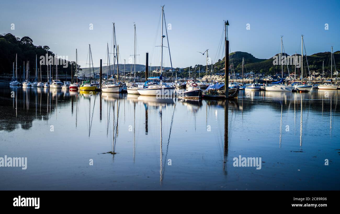 Conwy Harbour Moorings. Boat in Conwy Harbour in the town of Conwy North Wales. Wales Tourism. Conwy Tourism Stock Photo