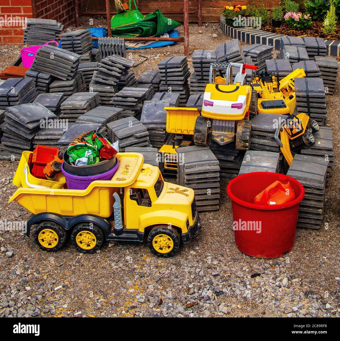 Construction industry illustrated with child's toy during Covid lockdown, Wales Stock Photo Alamy