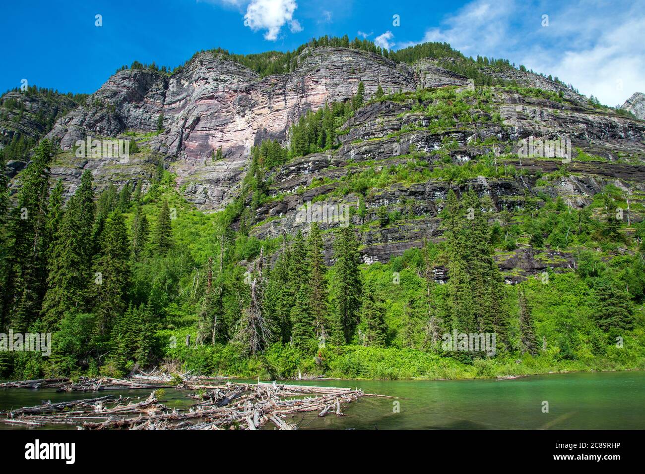 A mountain overlooking Avalanche Lake in Glacier National Park. Stock Photo