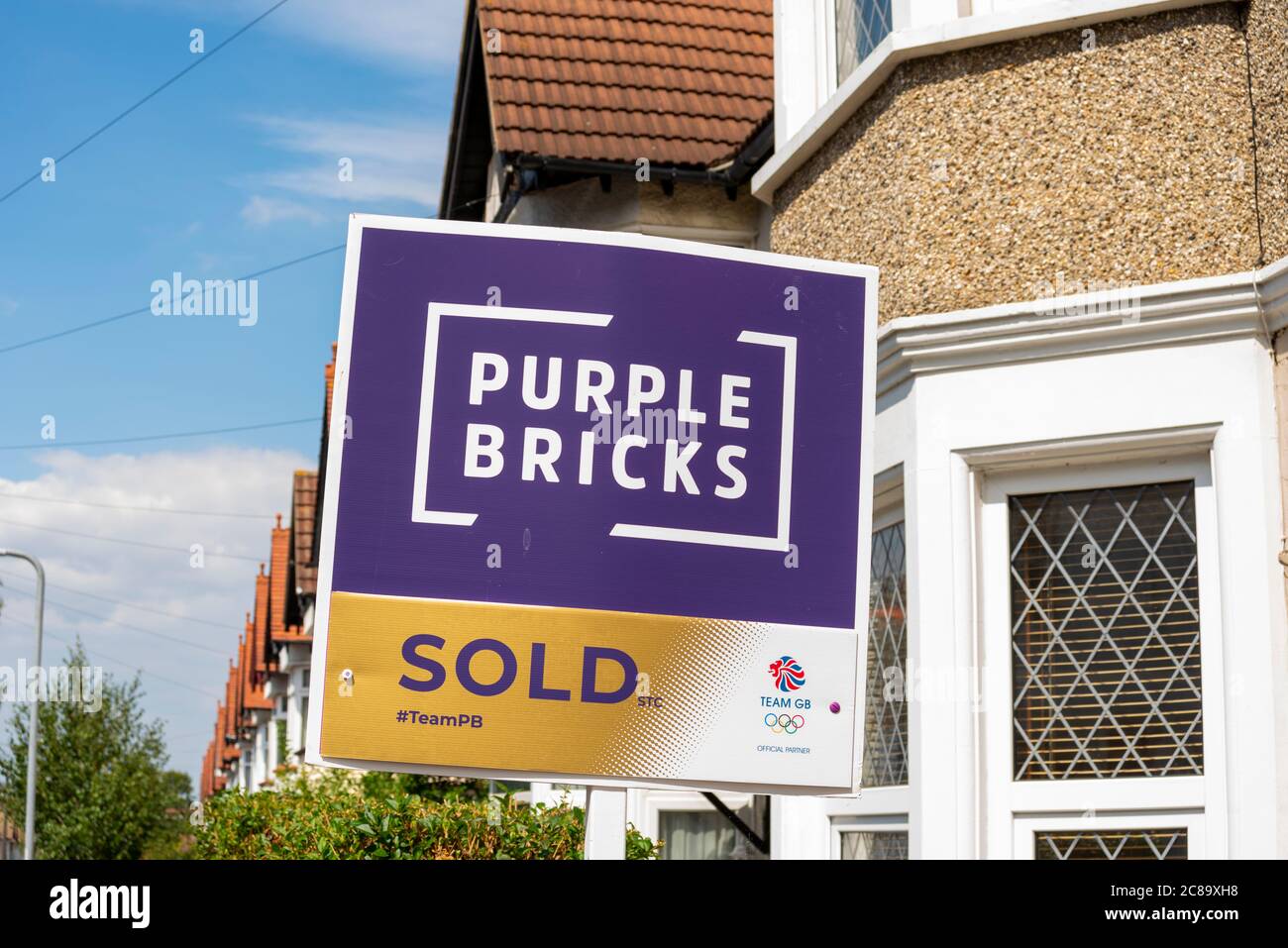 Purple Bricks estate agent sold sign outside property in Westcliff on Sea, Southend, Essex, UK. Team GB Olympics 2020 sponsorship. Tokyo 2020, 2021 Stock Photo