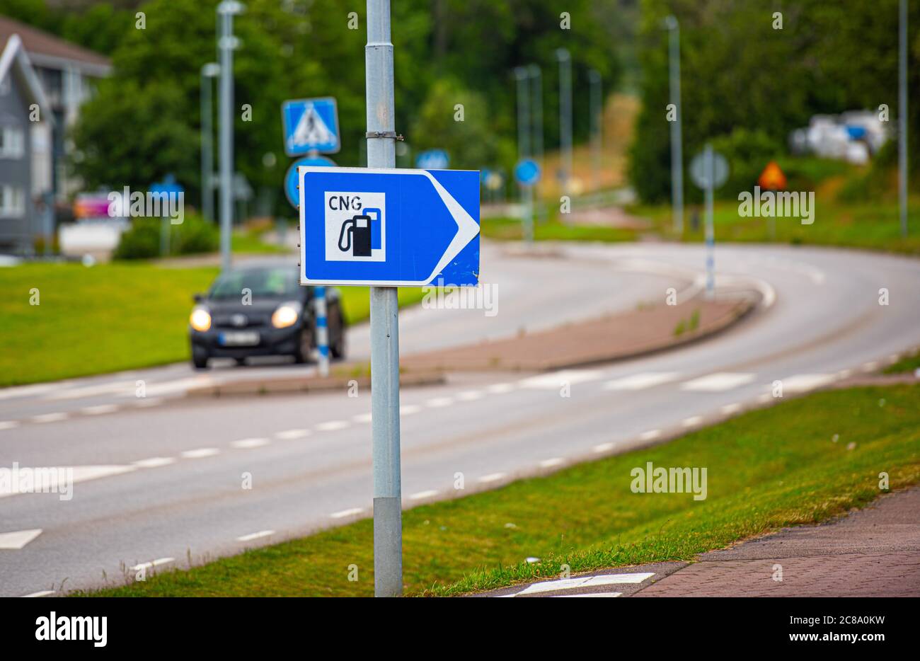 Sign pointing to a CNG filling station. Stock Photo